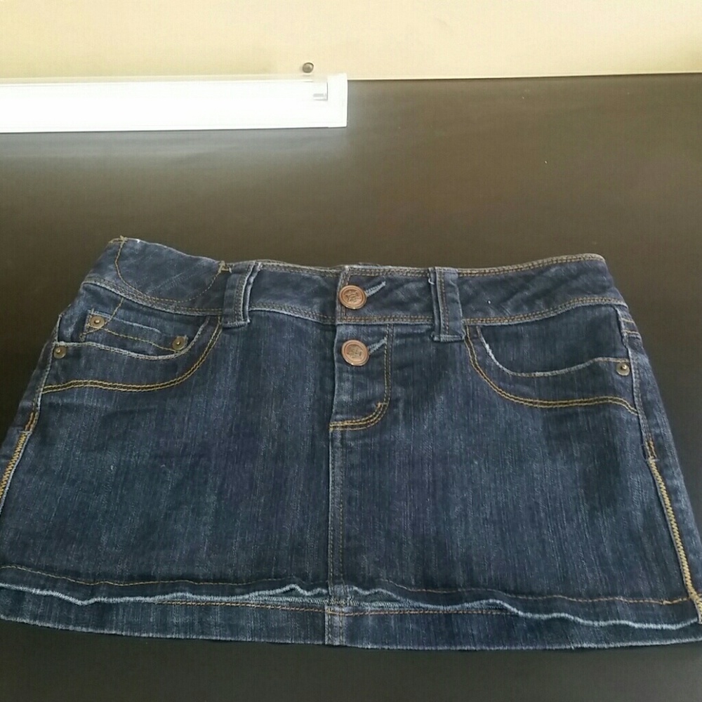 Jean skirt with brown leather pocket design!!
